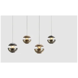 Gold Floating Globe Pendant Light in brushed brass — in a room setting
