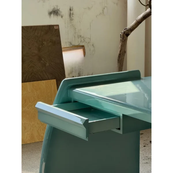 Gradient Blue Lacquered Desk with Hidden Drawer in blue — in a room setting