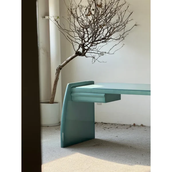 Gradient Blue Lacquered Desk with Hidden Drawer in blue — in a room setting