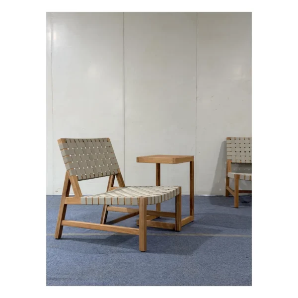 Teak Outdoor Lounge Chair with 45 mm Woven Webbing in natural oak — in a room setting