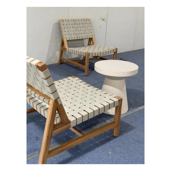 Teak Outdoor Lounge Chair with 45 mm Woven Webbing in natural oak — in a room setting