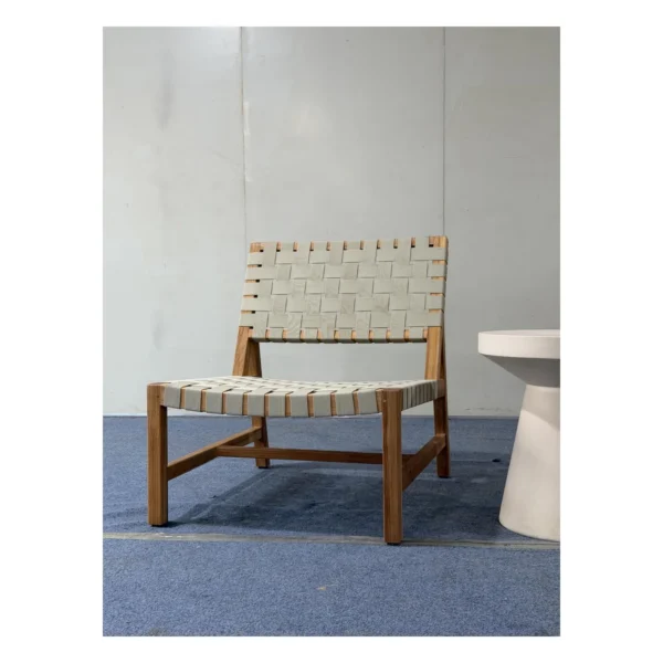 Teak Outdoor Lounge Chair with 45 mm Woven Webbing in natural oak — in a room setting