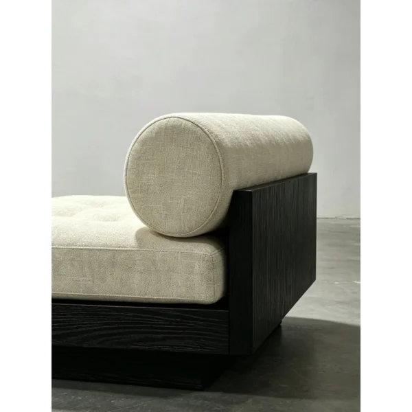 Black Oak Plinth Lounge Chair with Linen Cushion and Bolster in black — in a room setting