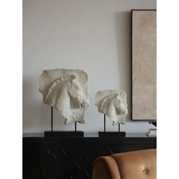 Greek Horse Relief Fragment on Black Metal Stand in ivory — in a room setting