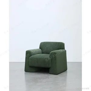 Forest Green Fully Upholstered Block Lounge Chair in olive — in a room setting