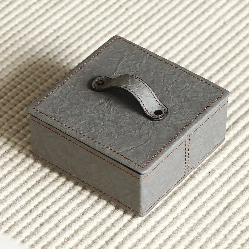 Grey Crinkled Leather Lidded Storage Box with Strap Pull in slate — front view