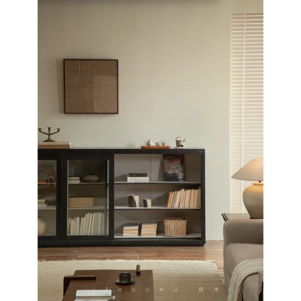 Blackened Teak Glass-Door Low Display Cabinet in black — in a room setting