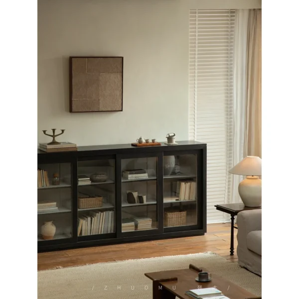 Blackened Teak Glass-Door Low Display Cabinet in black — in a room setting