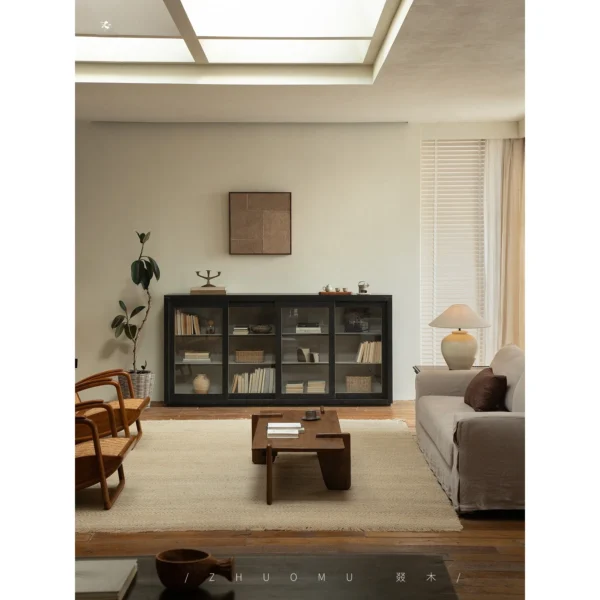Blackened Teak Glass-Door Low Display Cabinet in black — in a room setting
