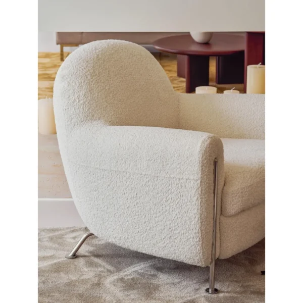 Hamburger Lounge Chair in White Shearling on Steel Legs — in a room setting