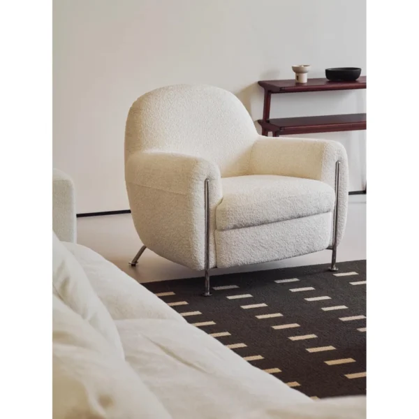 Hamburger Lounge Chair in White Shearling on Steel Legs — in a room setting