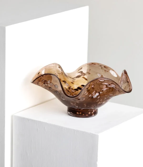 Hand-Blown Brown Ripple Glass Fruit Bowl in clay — in a room setting
