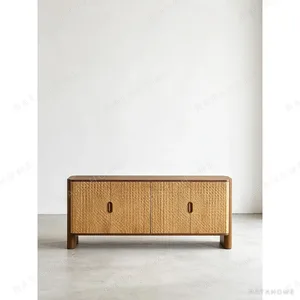 Hand-Carved Textured Oak Sideboard in natural oak — in a room setting