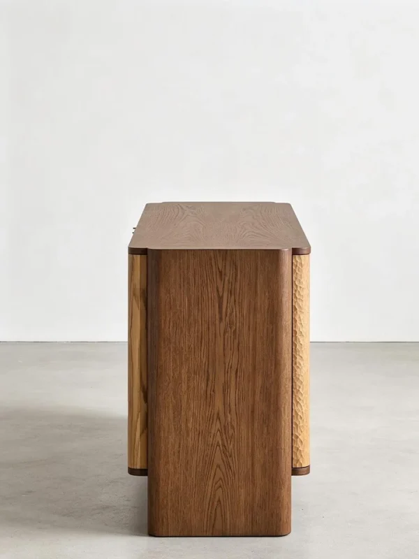 Hand-Carved Textured Oak Sideboard in natural oak — in a room setting
