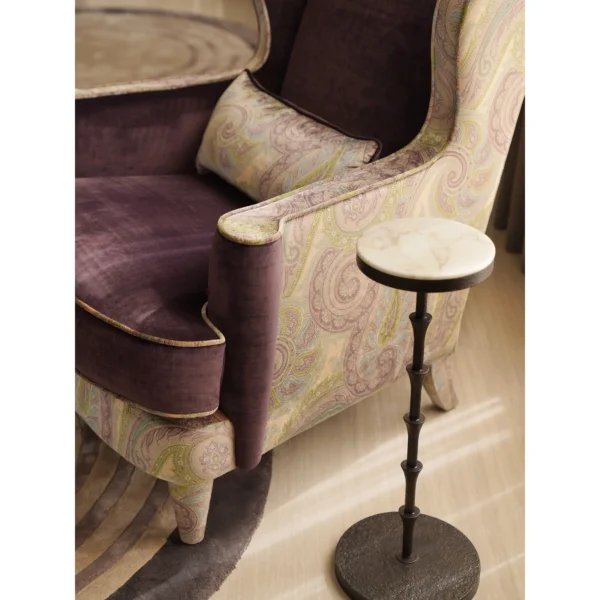 Hand-Forged Bamboo-Node Iron Side Table in black — in a room setting