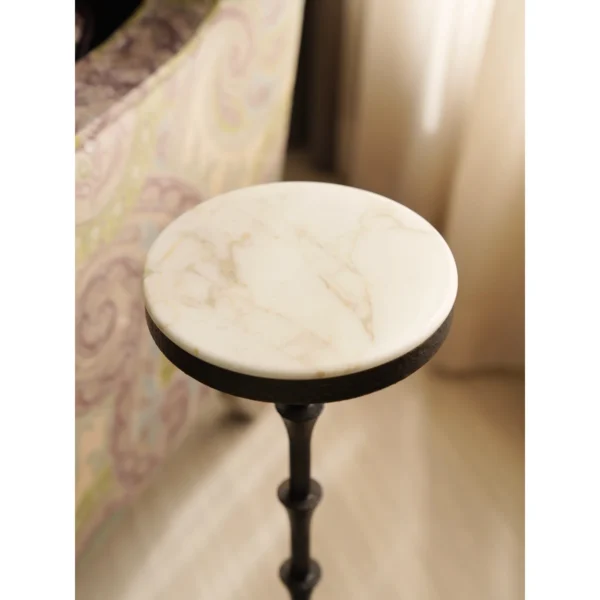Hand-Forged Bamboo-Node Iron Side Table in black — in a room setting