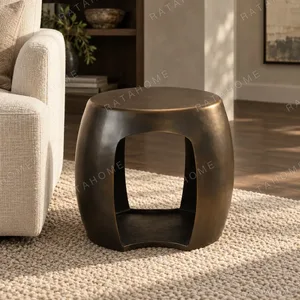 Hand-Forged Brass Drum Side Table, 49 cm in black — in a room setting