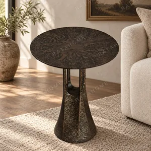 Hand-Forged Bronze Side Table with Hammered Texture in bronze — in a room setting