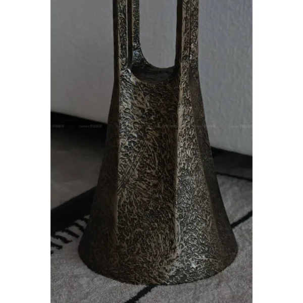 Hand-Forged Bronze Side Table with Hammered Texture in bronze — in a room setting