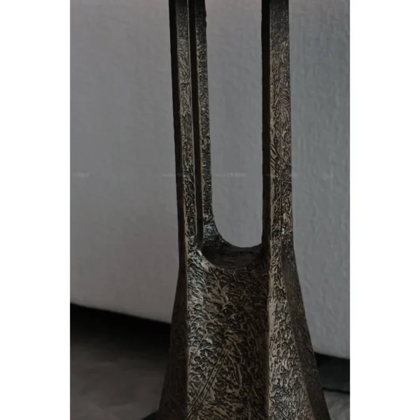 Hand-Forged Bronze Side Table with Hammered Texture in bronze — in a room setting