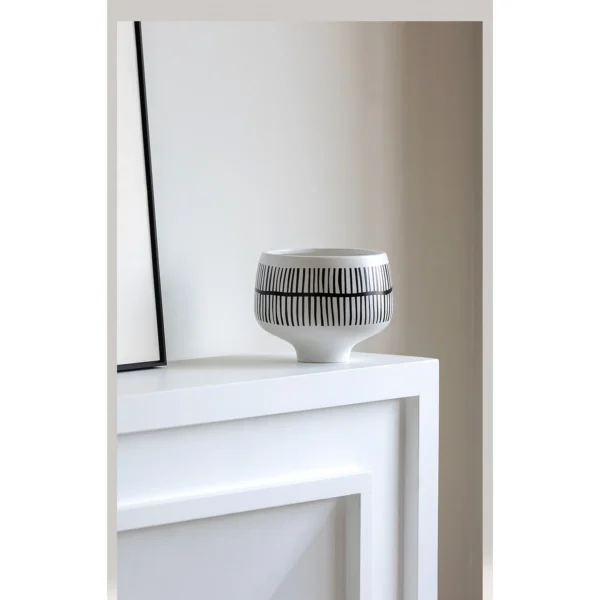 Hand-Painted Black Line Footed Bowl Vase in White — in a room setting