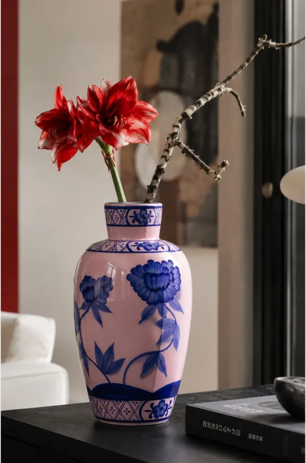 Hand-Painted Blue Peony on Pink Ceramic Vase in rose stone — in a room setting