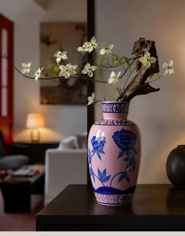 Hand-Painted Blue Peony on Pink Ceramic Vase in rose stone — in a room setting