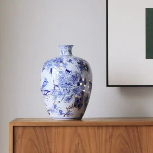Hand-Painted Blue and White Gilded Fruit-Branch Vase in ivory — in a room setting