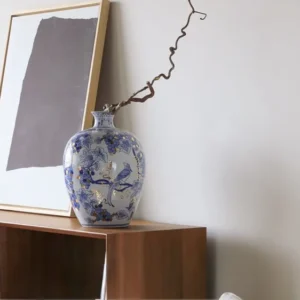 Hand-Painted Blue and White Gilded Fruit-Branch Vase in ivory — in a room setting