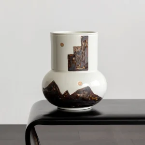Hand-Painted Mountain Motif Cream Ceramic Vase in oatmeal — in a room setting