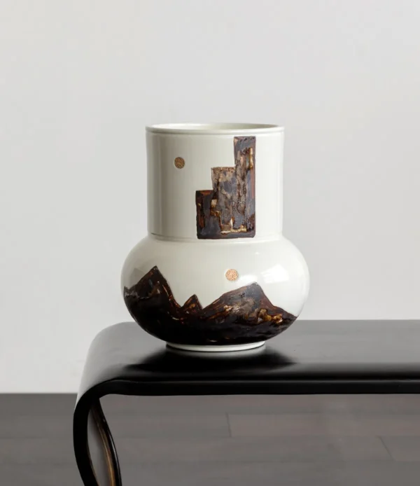 Hand-Painted Mountain Motif Cream Ceramic Vase in oatmeal — in a room setting