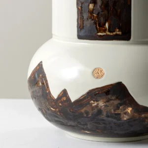 Hand-Painted Mountain Motif Cream Ceramic Vase in oatmeal — in a room setting
