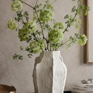 Designer Hand-Pinched Angular White Ceramic Vase, Small or in ivory — in a room setting