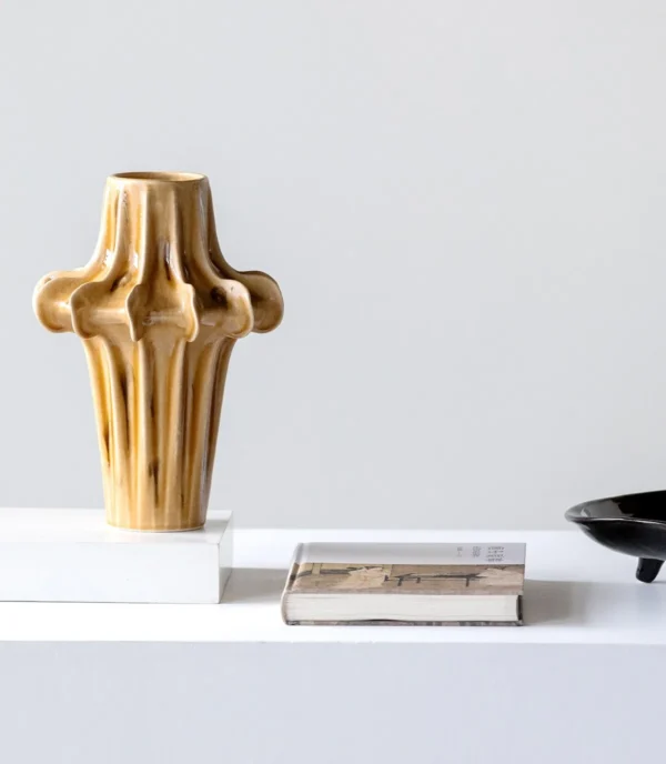 Hand-Sculpted Four-Lobed Stoneware Vase in Caramel Glaze — in a room setting