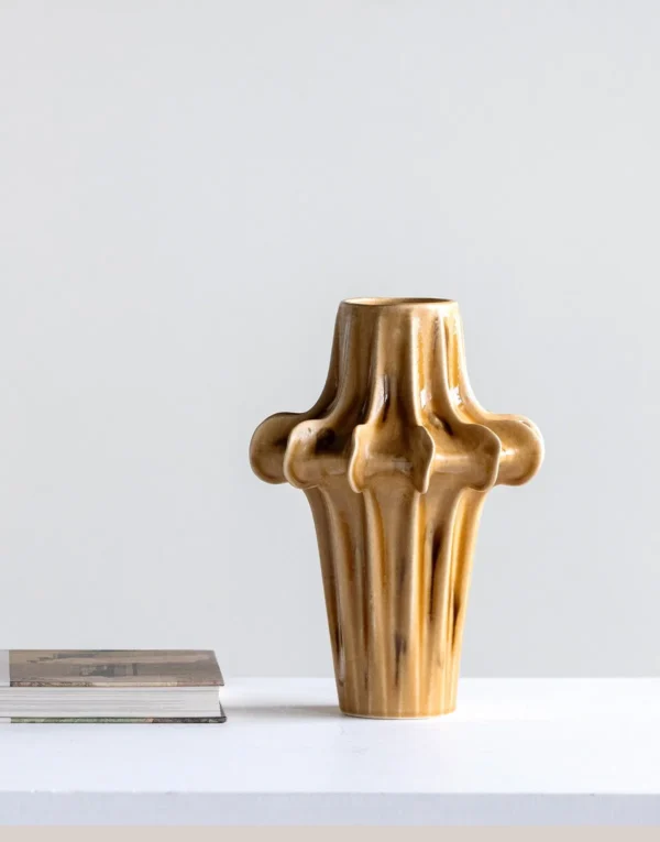 Hand-Sculpted Four-Lobed Stoneware Vase in Caramel Glaze — in a room setting