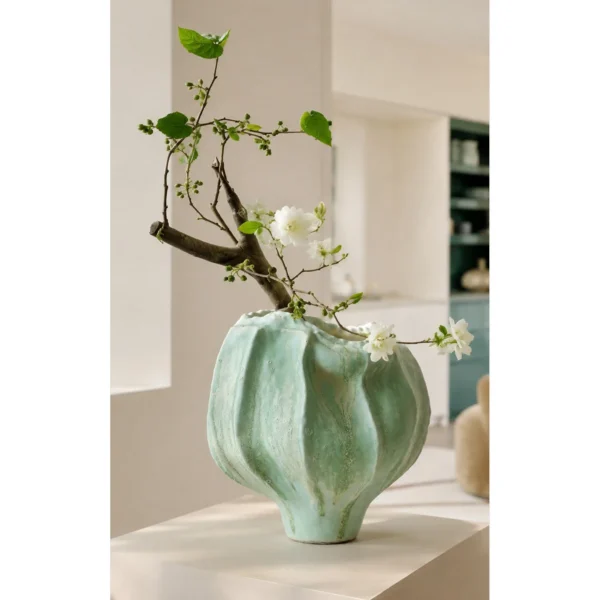 Hand-Sculpted Multi-Edged Stoneware Vase in Celadon Green — in a room setting