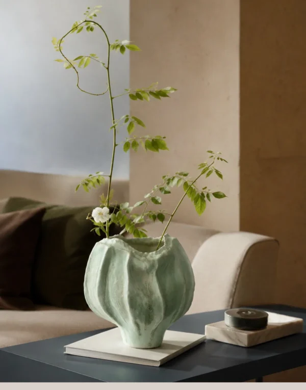 Hand-Sculpted Multi-Edged Stoneware Vase in Celadon Green — in a room setting