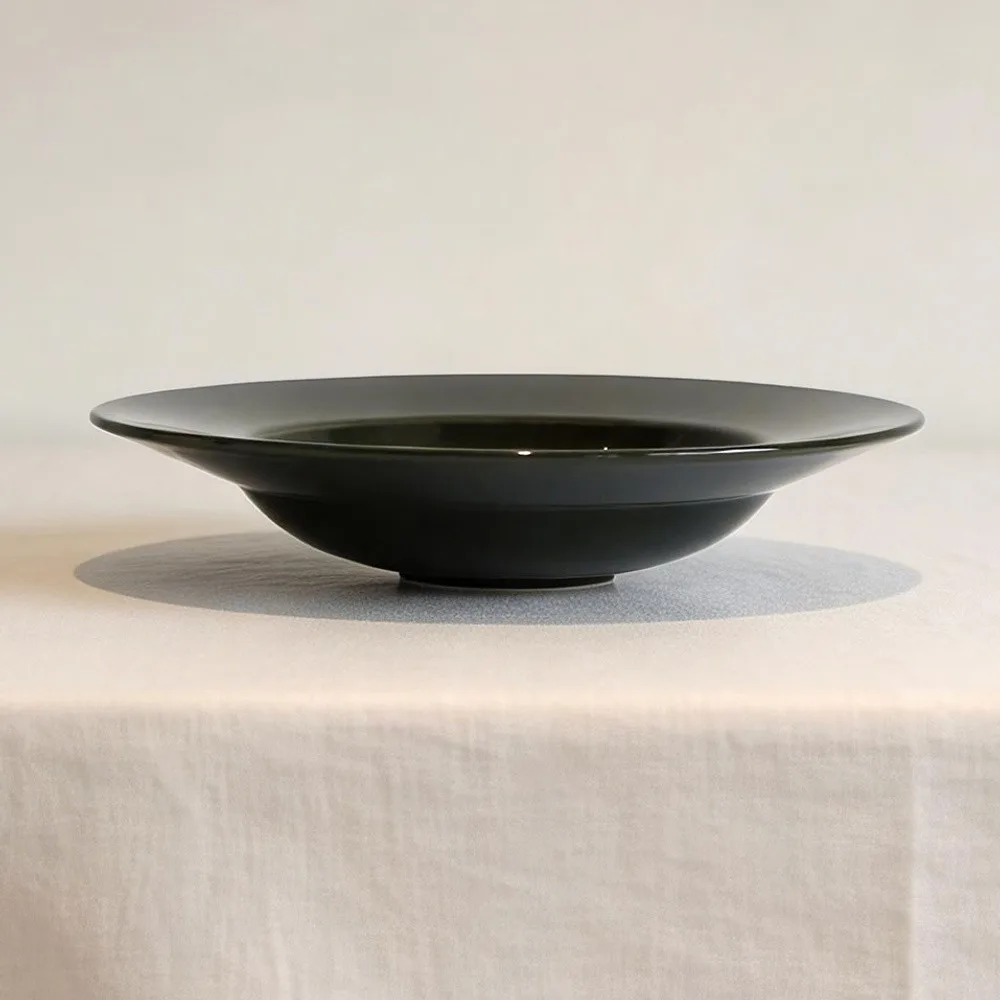 Hand-Made Black Glaze Wide-Rim Deep Plate in black — front view