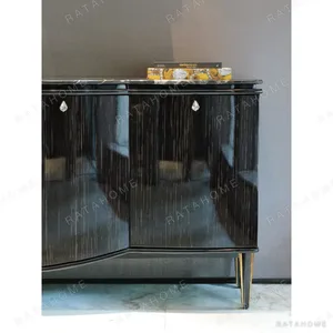 Gloss Ebony Sideboard with Marble Top and Crystal Pulls in black — in a room setting