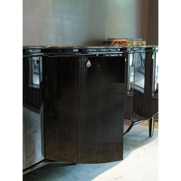 Gloss Ebony Sideboard with Marble Top and Crystal Pulls in black — in a room setting