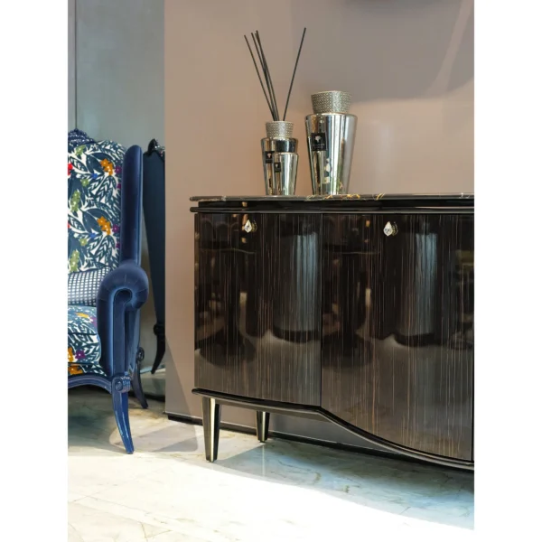 Gloss Ebony Sideboard with Marble Top and Crystal Pulls in black — in a room setting