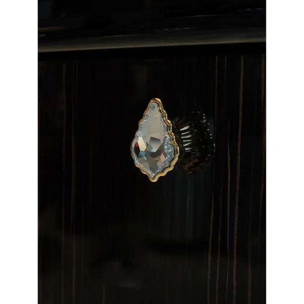 Gloss Ebony Sideboard with Marble Top and Crystal Pulls in black — in a room setting