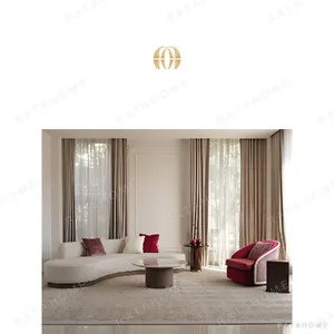 Handmade Curved Sofa in Cream Bouclé on Walnut Base — in a room setting