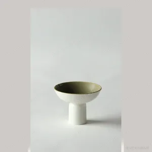 Hand-Made Footed Ceramic Dish in Pale Moss Green — in a room setting