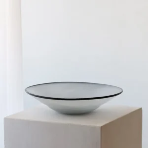 Designer Hand-Made Glass Fruit Bowl in slate — in a room setting