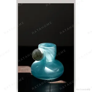 Hand-Made Pink Glass Vase with Sphere Accent, Three Colours in rose stone — in a room setting