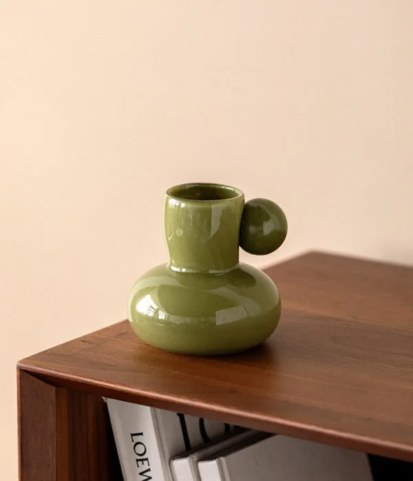 Hand-Made Pink Glass Vase with Sphere Accent, Three Colours in rose stone — in a room setting