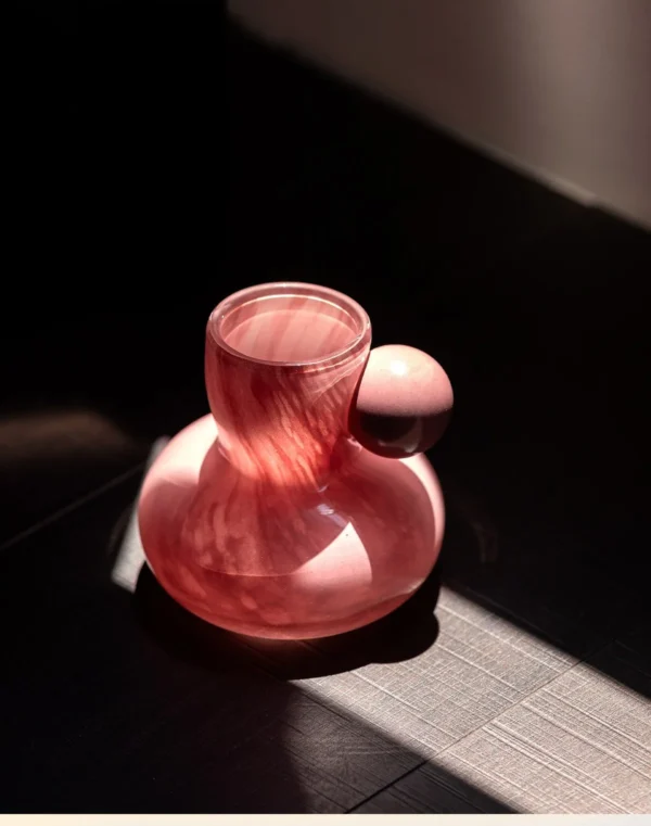 Hand-Made Pink Glass Vase with Sphere Accent, Three Colours in rose stone — in a room setting