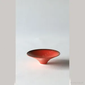 Hand-Made Gradient Red Conical Bowl in red — in a room setting