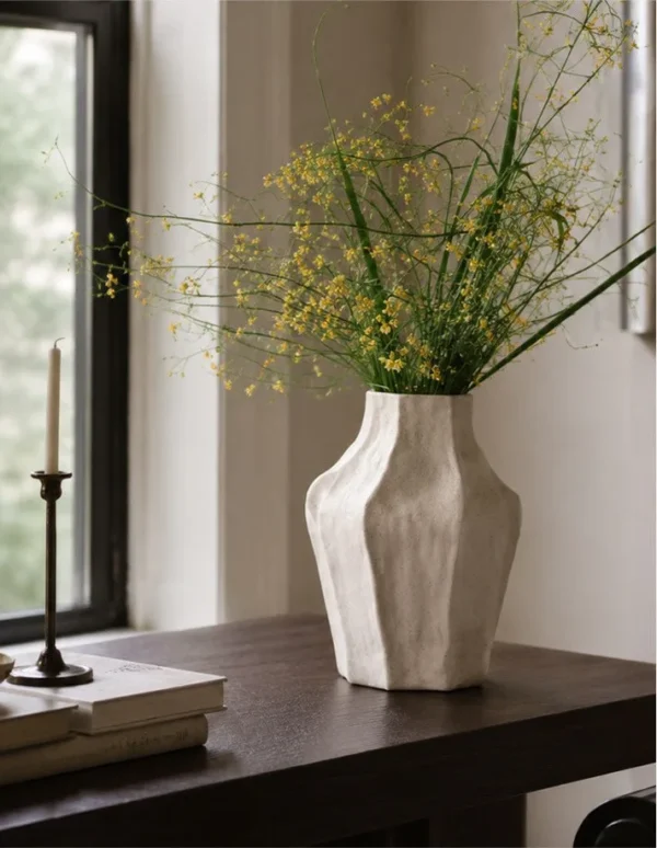 Designer Irregular Faceted White Ceramic Vase, Small or in ivory — in a room setting